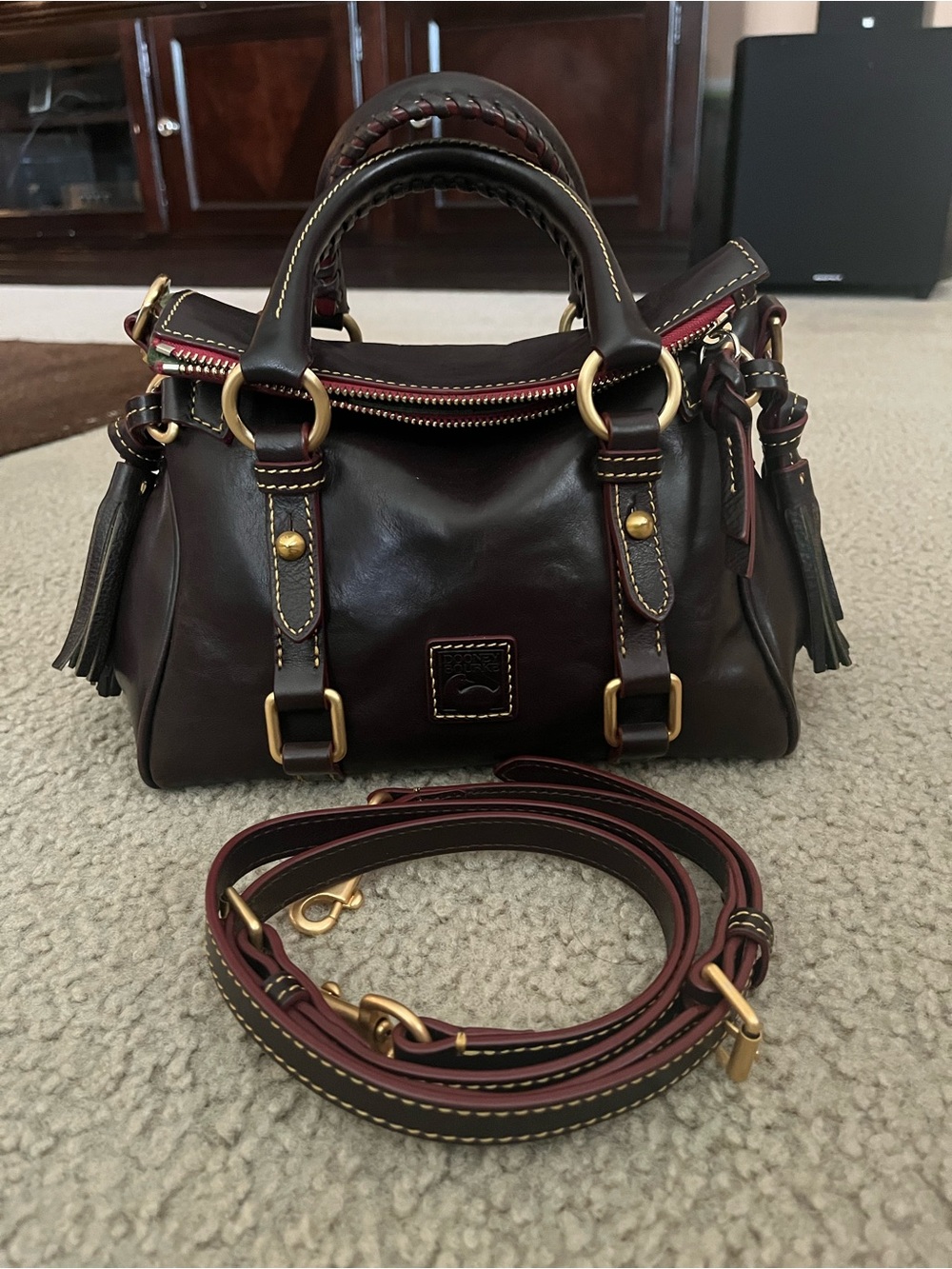 Dooney and Bourke micro Florentine satchel in the color Tmoro  brown